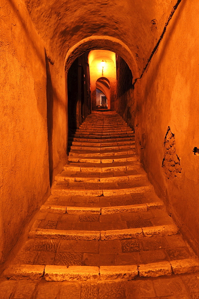 Stairs in tunnel under houses, Pitigliano, Province Grosseto, southern Tuscany, Italy, Europe