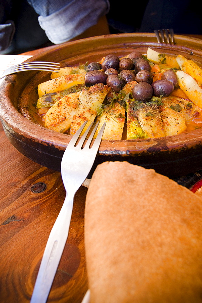 Tajine with bread and olives, oasis, Morocco, North Africa, Africa