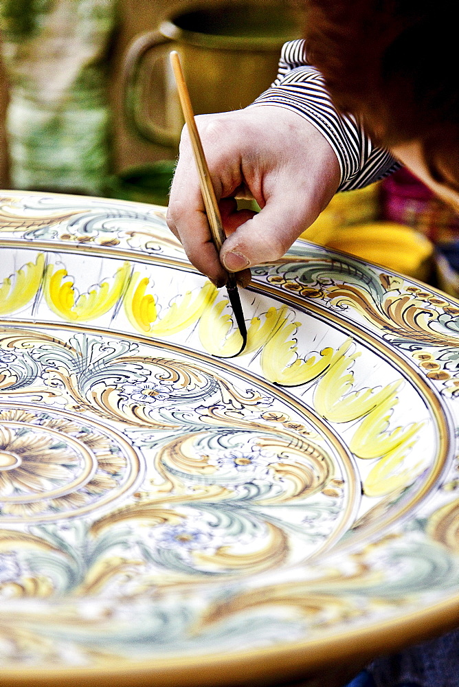 Women painting pottery, Caltegirone, Sicily, Italy