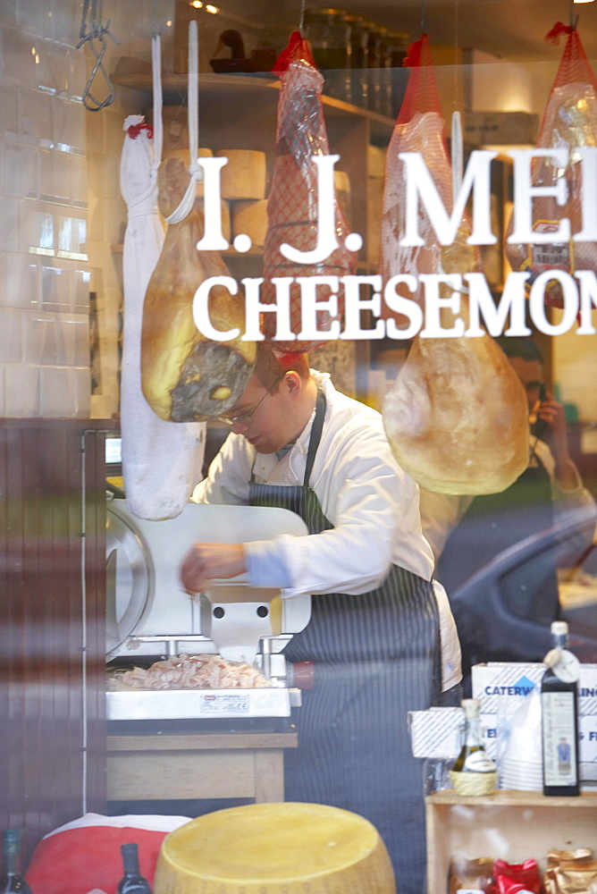 Butcher working, in St. Andrews, Scottland