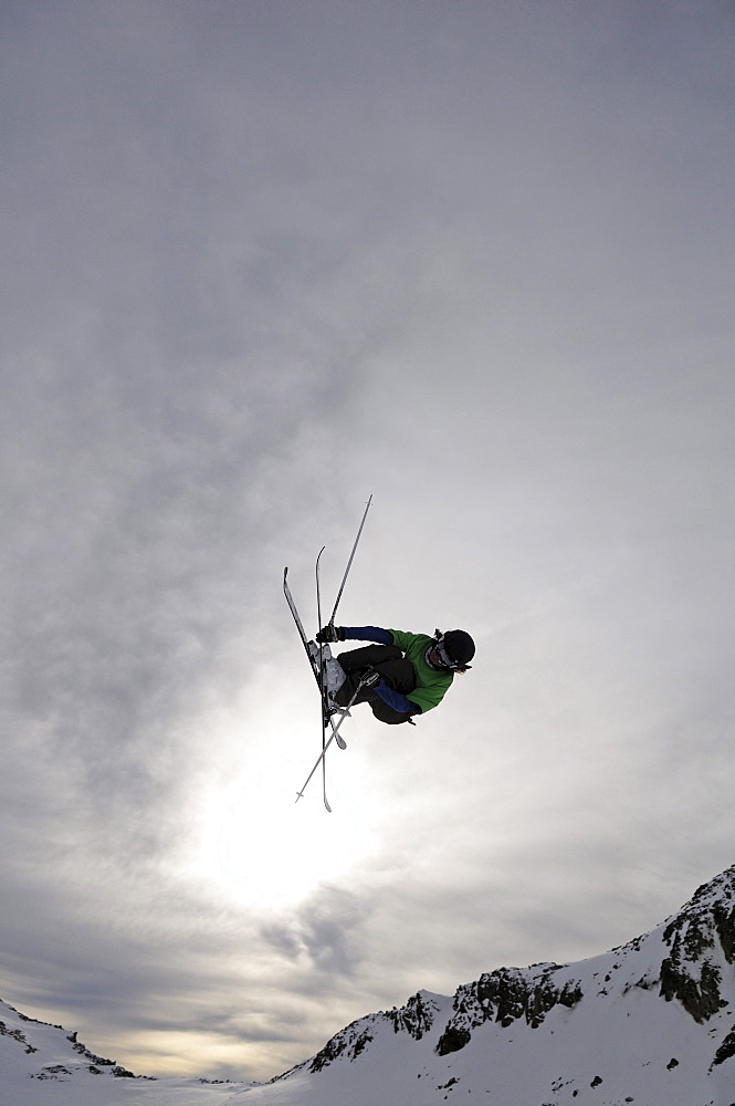 Freeskier during jump, Stubai glacier, Stubai Alps, Tyrol, Austria, Europe