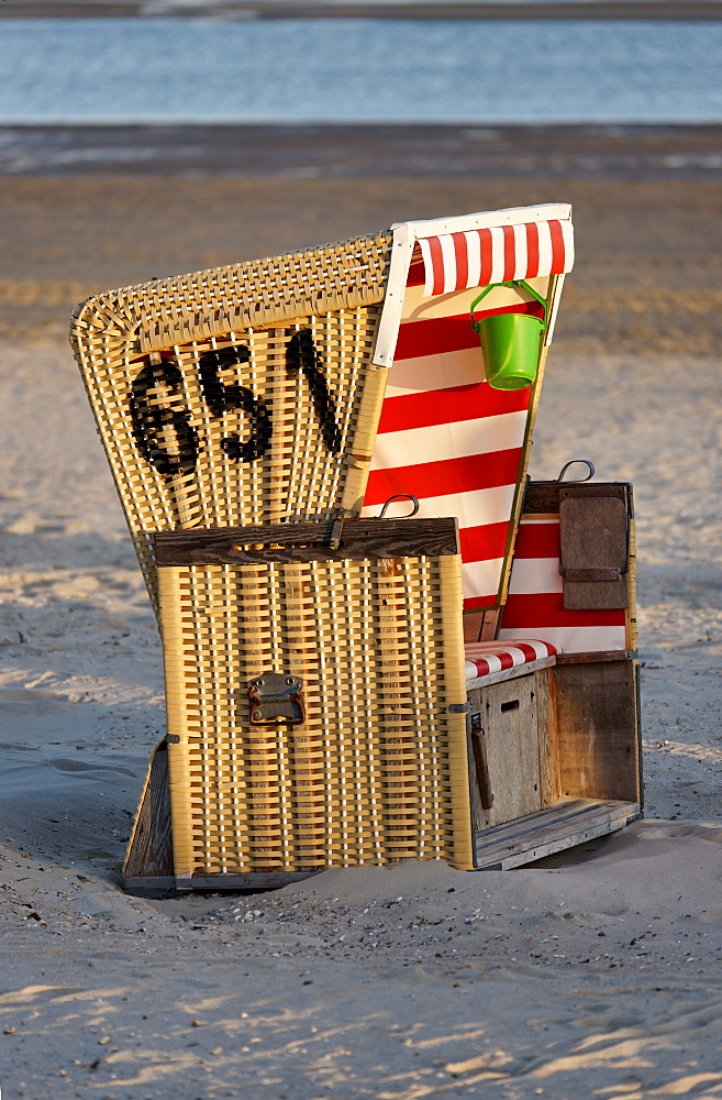 Canopied Beach Chair on the beach, North Sea Spa Resort Langeoog, East Frisia, Lower Saxony, Germany