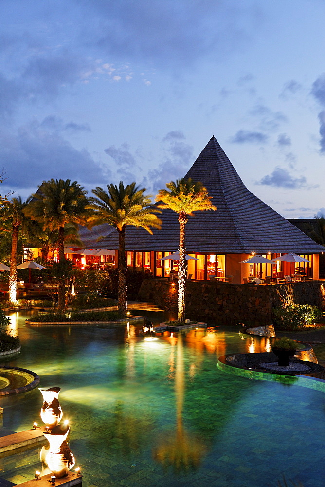 Pool and restaurant at Shanti Maurice Resort in the evening, Souillac, Mauritius, Africa