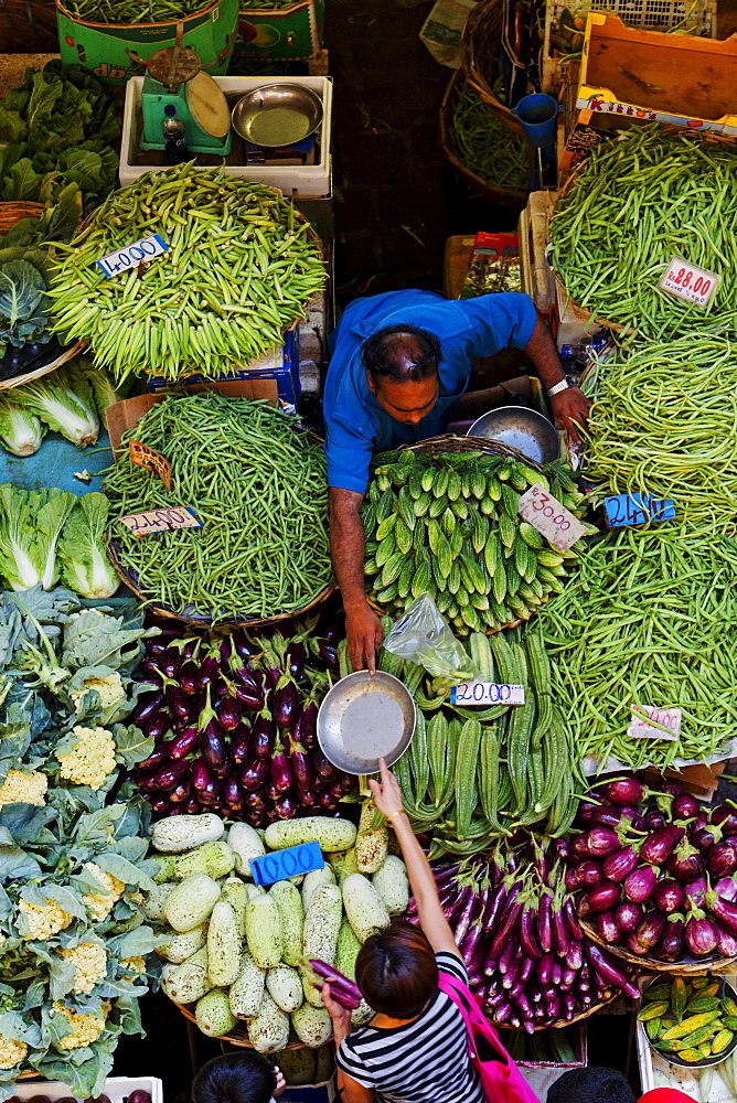 People at stalls in the market hall, Port Louis, Mauritius, Africa