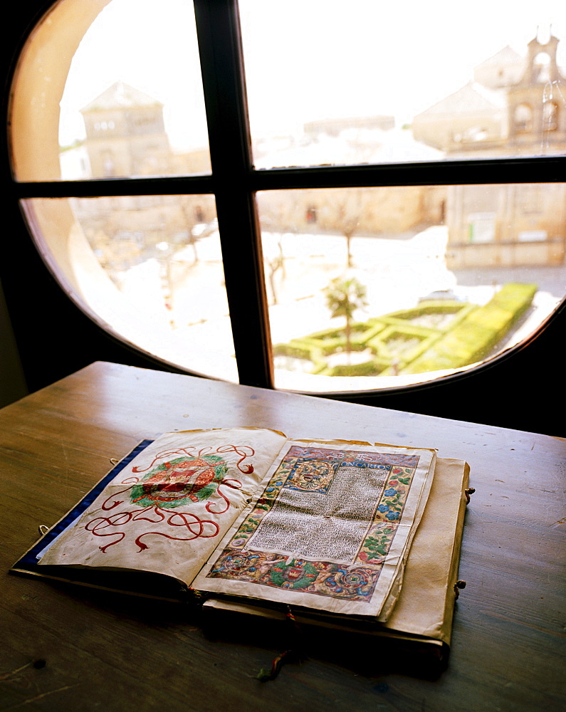 Book from the 16th century, view on Plaza Vasquez de Molina, archive of Palacio de las Cadenas, â„beda, Andalusia, Spain