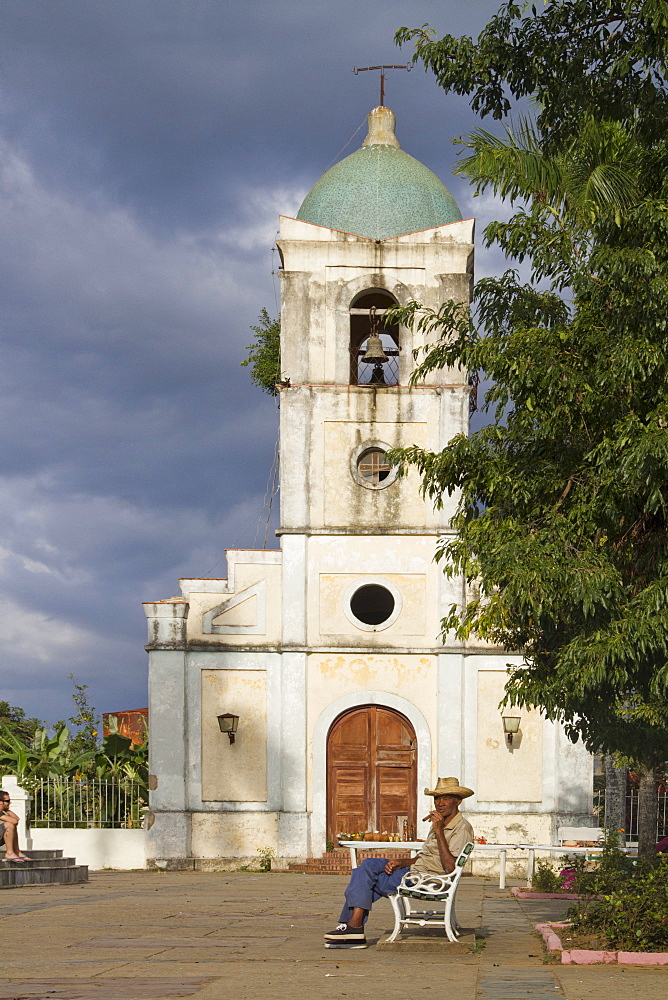 Old Man with cigar in front of village church, Vinales Valley, Province Pinar del Rio, Cuba, Greater Antilles, Antilles, Carribean, West Indies, Central America, North America, America