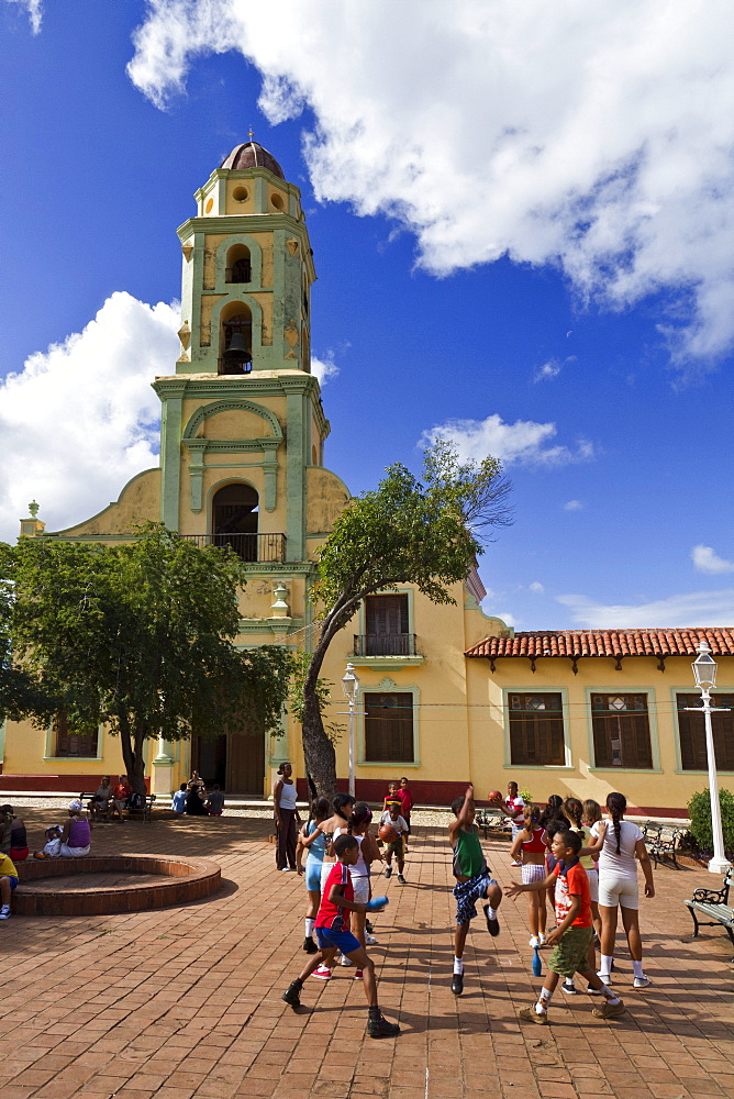 School class sports, Bell tower of Iglesia y Convento de San Francisco, Trinidad, Cuba, Greater Antilles, Antilles, Carribean, West Indies, Central America, North America, America