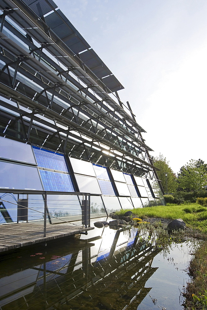 Factory building with solar installation, Freiburg im Breisgau, Baden-Wuerttemberg, Germany, Europe