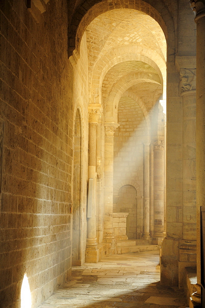 Light beam in romanesque church San Antimo, San Antimo, Tuscany, Italy