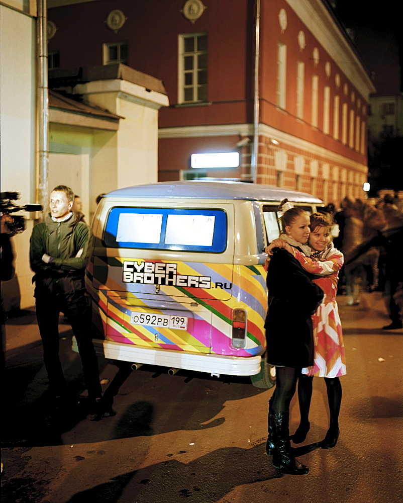 People and media bus with screens at the Night of the Open Museum, in front of former spirits factory Winzavod Center for Contemporary Art, Moscow, Russia, Europe