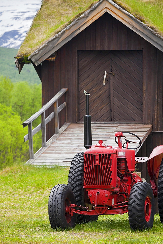 Red tractor in an open-air museum in Elverum, Bardu, Nordland, Norway