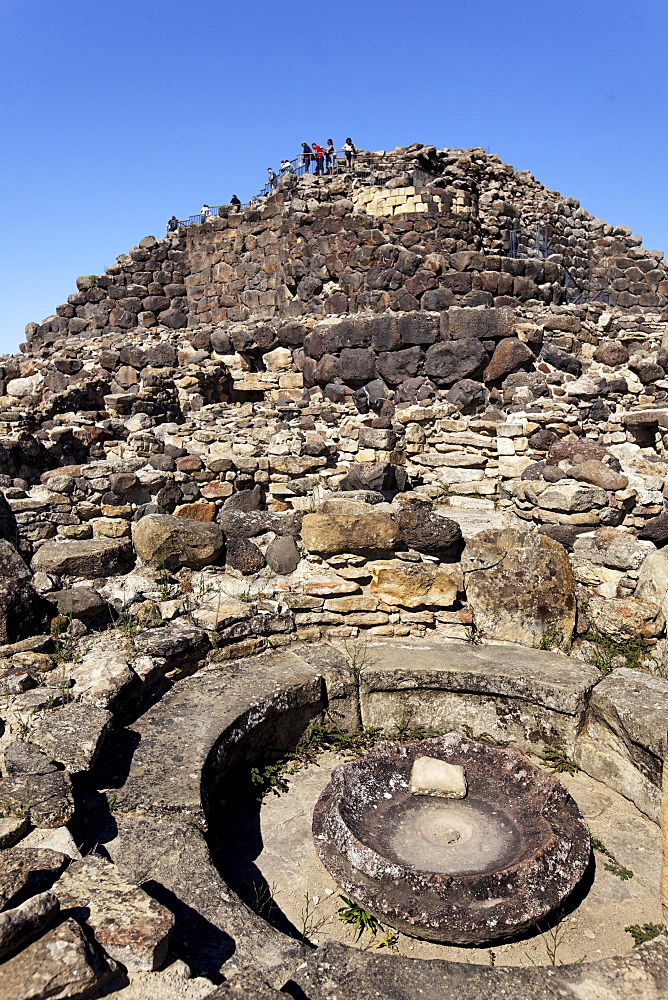 Tourists, at the ruins, Nuraghe Su Nuraxi, Barumi, Sardinia, Italy