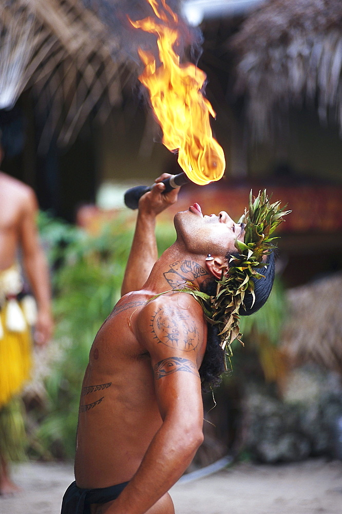 Fire-dancer, Fire-eater Taputo, Tiki Theatre Village, Moorea, French Polynesia, South Pacific