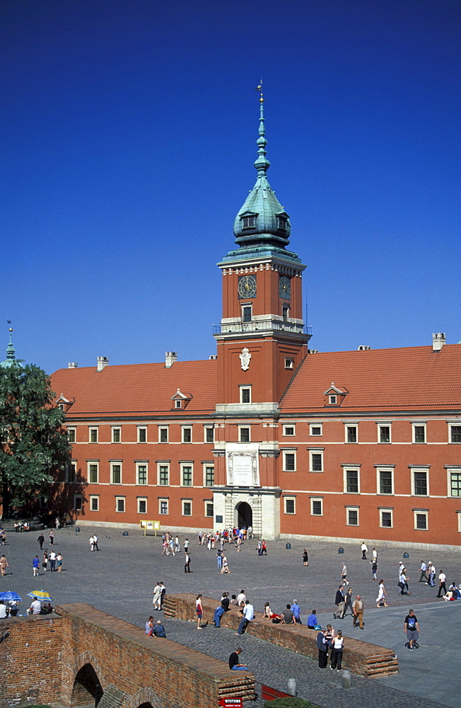 Royal Castle and Castle Square under blue sky, Warsaw, Poland, Europe