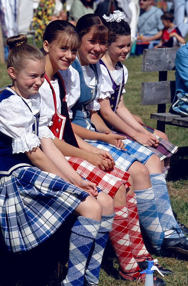 Highland Fling Dancers, gilrs on a bench, Glenfinnan Highland Games, Invernesshire, Scotland, Great Britain, Europe