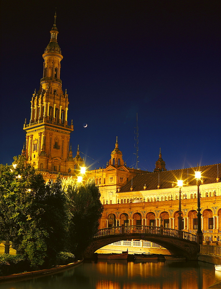 Illuminated cathedral and bridge at night, Plaza de Espana, Sevilla, Andalusia, Spain, Europe