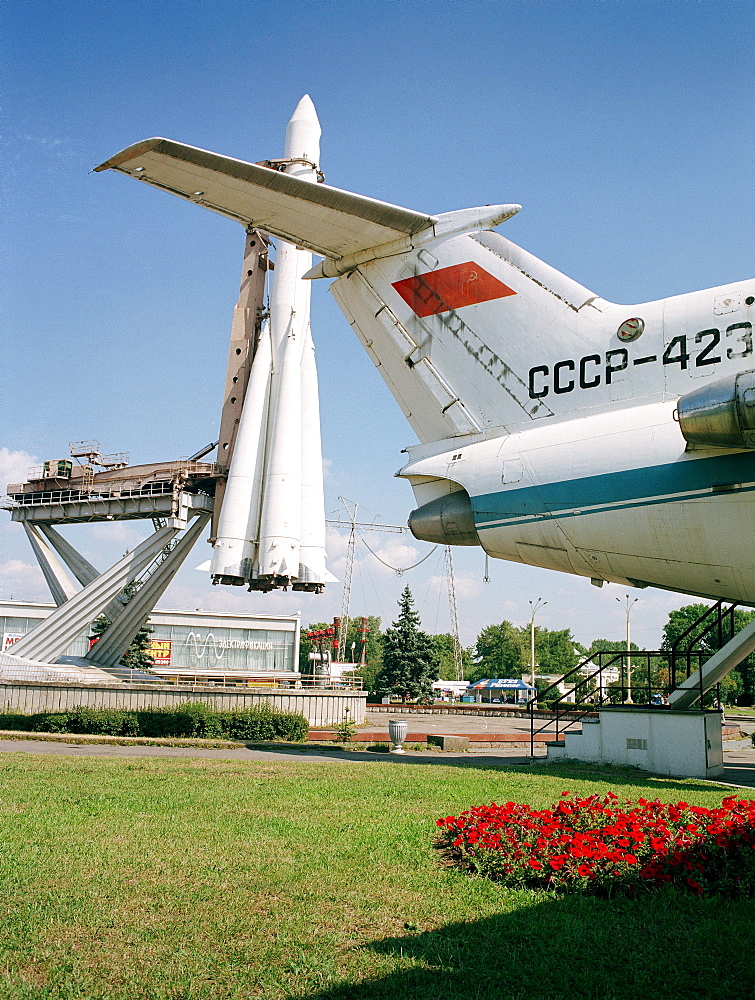 Soyuz rocket and tail of Yak-42 airplane in All-Russia Exhibition Centre, Moscow, Russia, before 2003