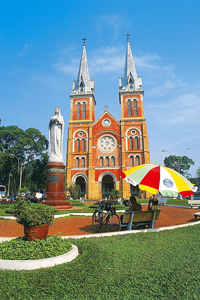 Notre Dame church and statue of Saint Mary at a park, Saigon, Vietnam, Asia