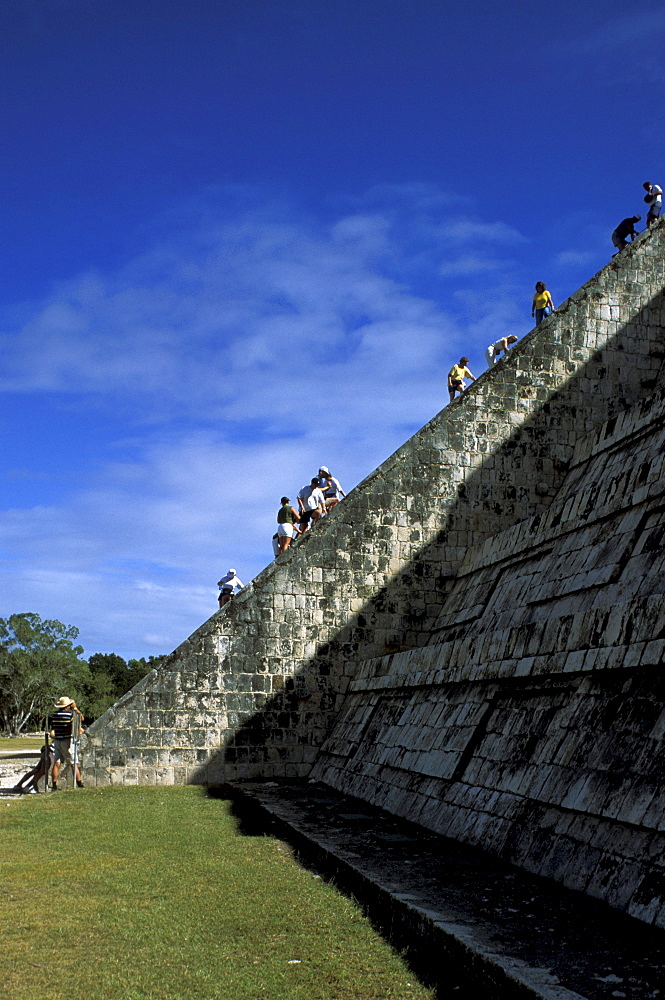 People climbing on a Maya temple, Castillo, Chichen Itza, Yucatan, Mexico, America