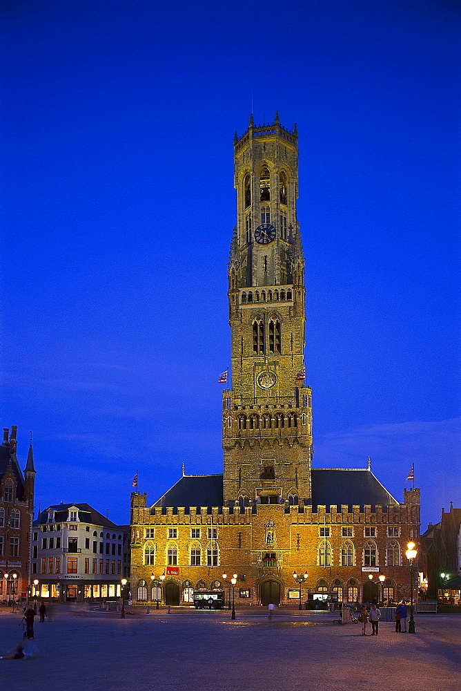 The illuminated tower Belfried at the market square at night, Bruges, Flanders, Belgium, Europe