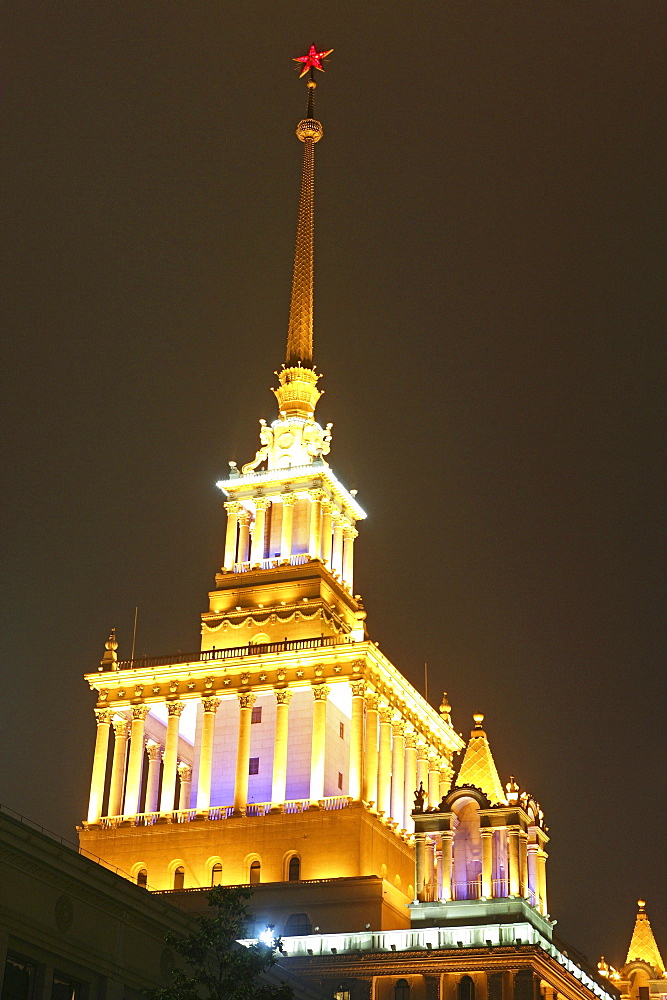 Shanghai Exhibition Center lit at night, Shanghai