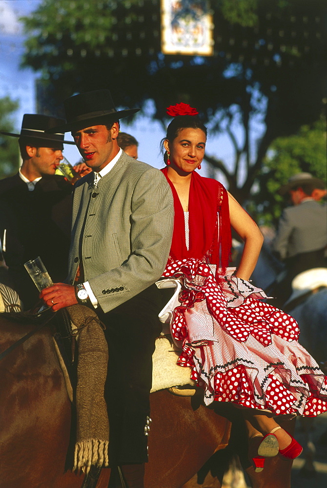 Couple on a horse, Feria de Abril, Sevilla, Andalusia, Spain120