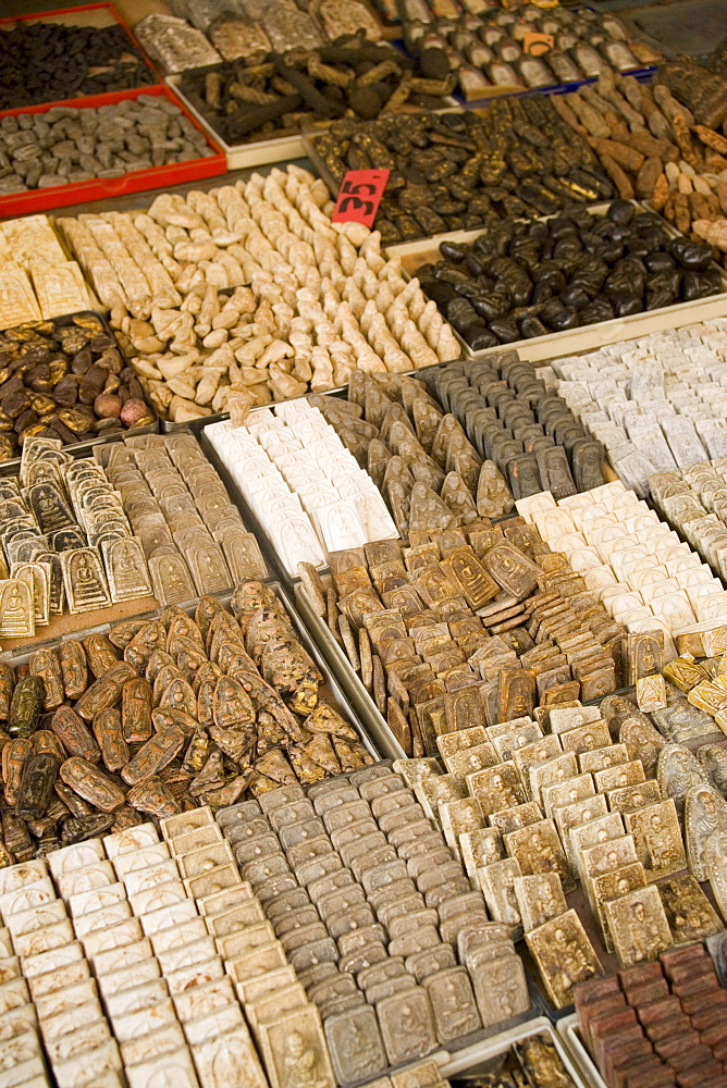 Different religious products offering at the Amulet Market, Ko Ratanakosin, Bangkok, Thailand