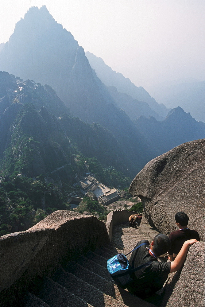 steep rock carved stone steps to Lotus Peak, Huang Shan, Anhui province, steep climb, stone steps, World Heritage, UNESCO, China, Asia