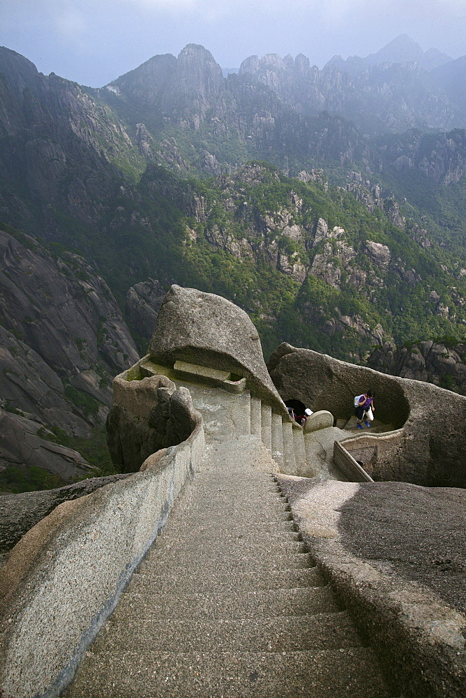 steep rock carved stone steps to Lotus Peak, Huang Shan, Anhui province, steep climb, stone steps, World Heritage, UNESCO, China, Asia