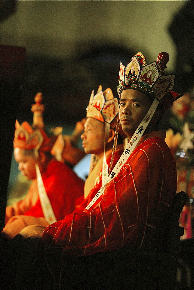 High-ranking monks at prayer service at Qiyuan monastery, Jiuhuashan, Anhui province, China, Asia