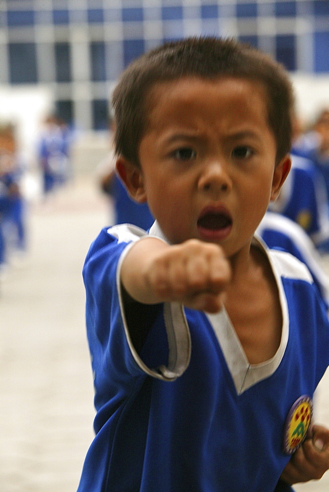 Kung Fu training at kindergarten age, at one of the many new Kung Fu schools in Dengfeng, school near Shaolin, Song Shan, Henan province, China, Asia