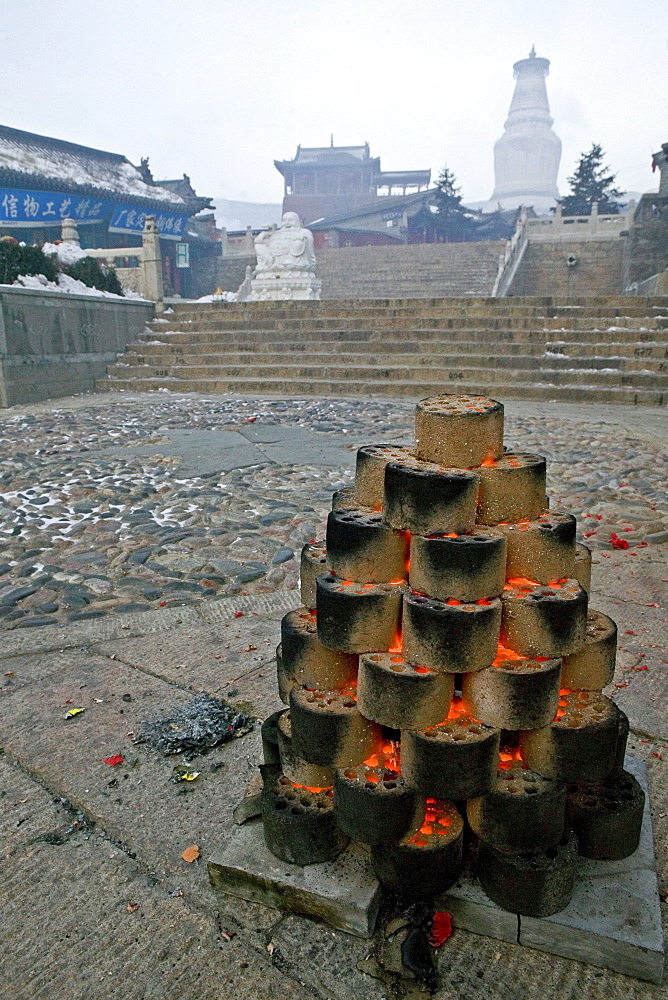 Fire with coal for the Chinese New Year festival, Great White Pagoda, village of Taihuai, Mount Wutai, Wutai Shan, Five Terrace Mountain, Buddhist centre, town of Taihuai, Shanxi province, China