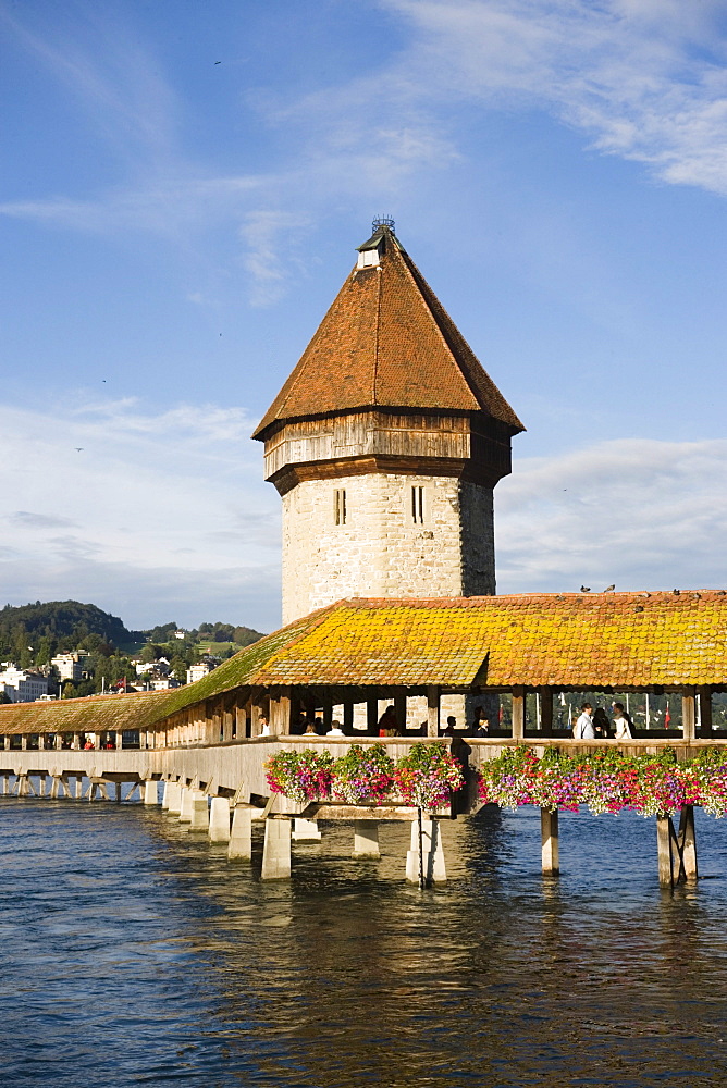 Reuss river with Kapellbruecke (chapel bridge, oldest covered bridge of Europe) and Wasserturm, Lucerne, Canton Lucerne, Switzerland