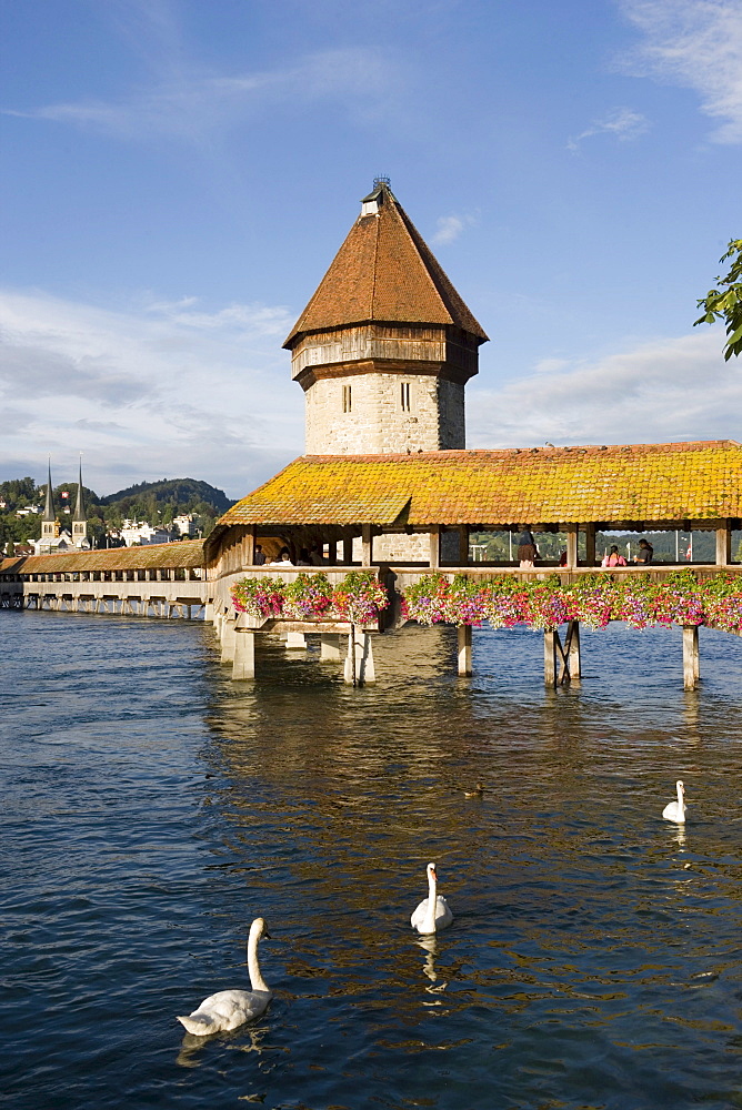 Reuss river with Kapellbruecke (chapel bridge, oldest covered bridge of Europe) and Wasserturm, Lucerne, Canton Lucerne, Switzerland