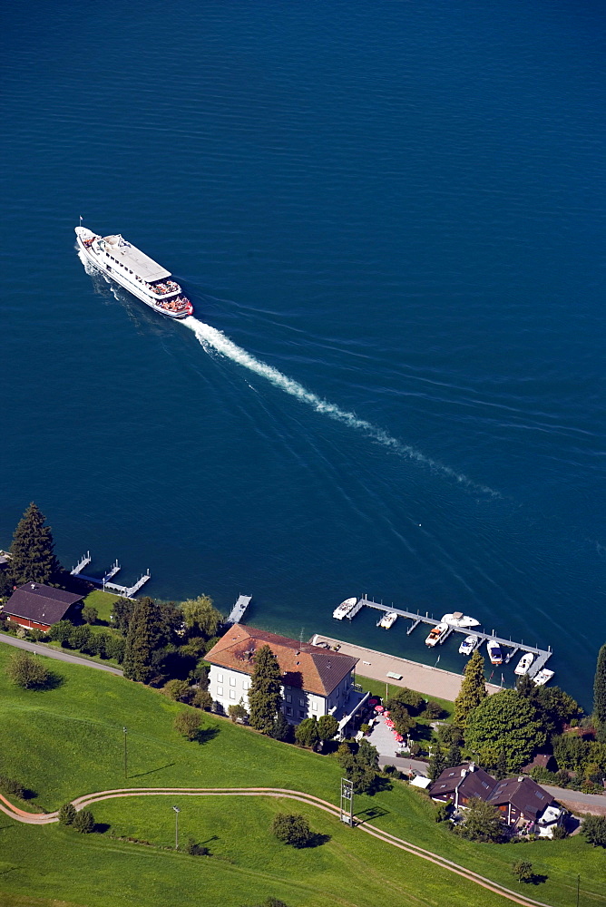 View from mountain Buergenstock (1128 m) to Lake Lucerne with excursion boat, ship station Kehrsiten, Lucerne, Canton Lucerne, Switzerland