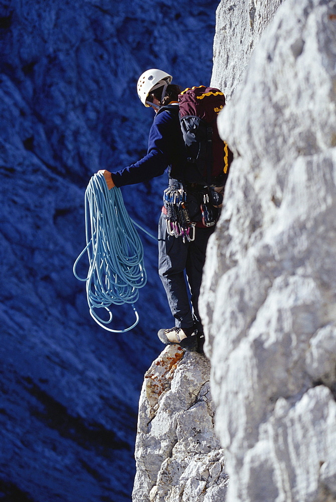 Man about to abseil, abseiling, Climbing rope, Alpine Climbing, Sport, Mountain, Wetterstein, Bavarian Alps, Bavaria, Germany