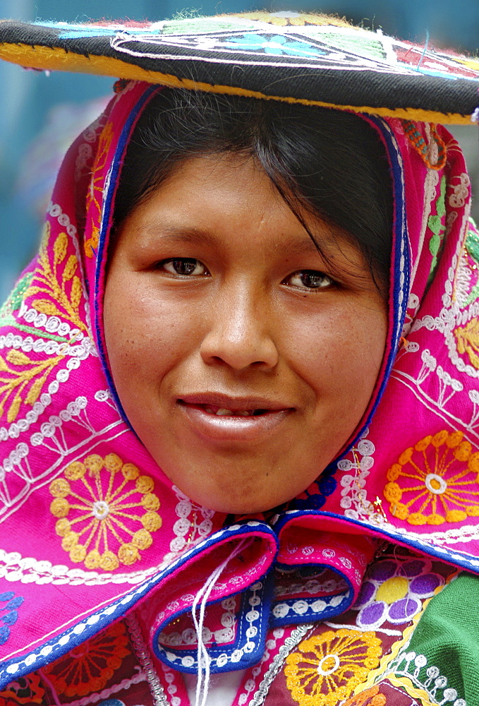 Inca woman with traditional headpiece in Aguas Calientes, Peru, South America