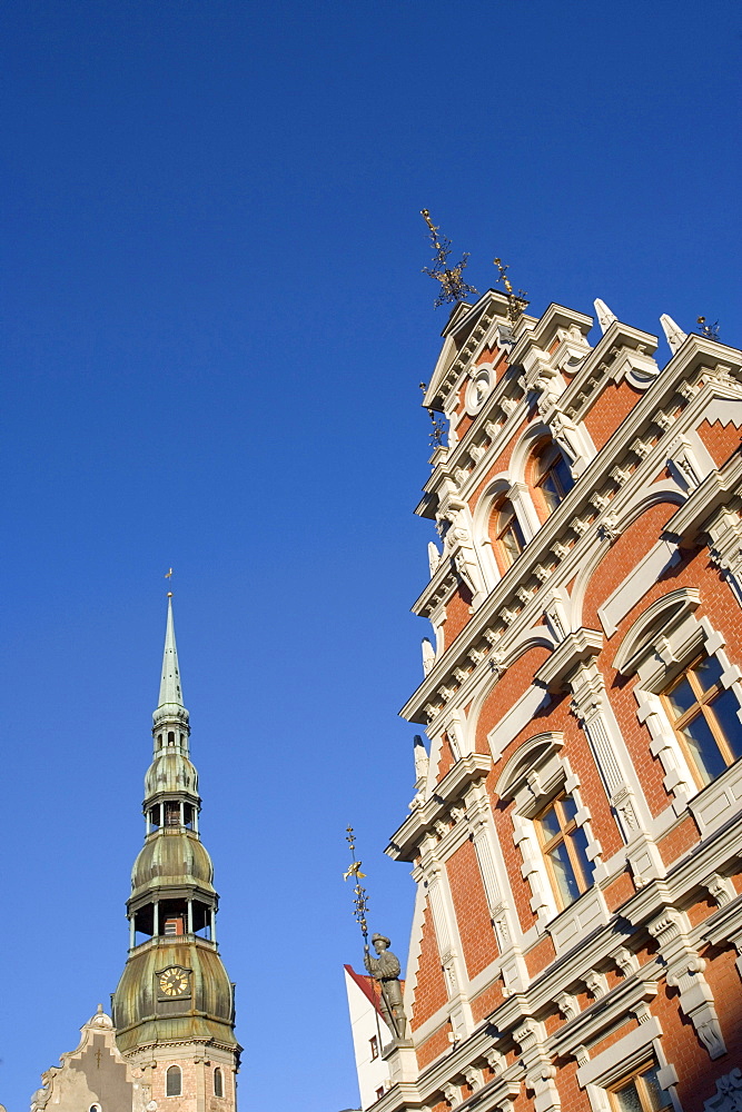 House of the Blackheads guild and church tower of Saint Peters church, Riga, Latvia