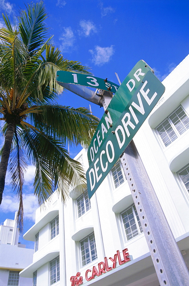 Street sign Ocean Drive with Hotel The Carlyle, South Beach, Miami, Florida, USA