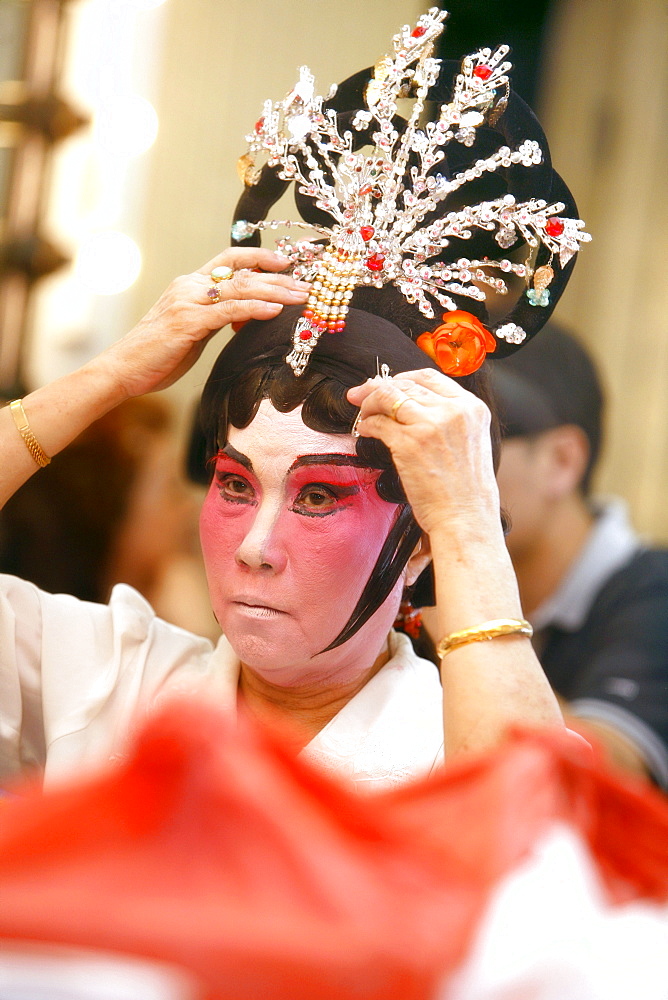 Woman in mask, Chinese Opera at the Kreta Ayer Theatre, Chinatown, Singapore