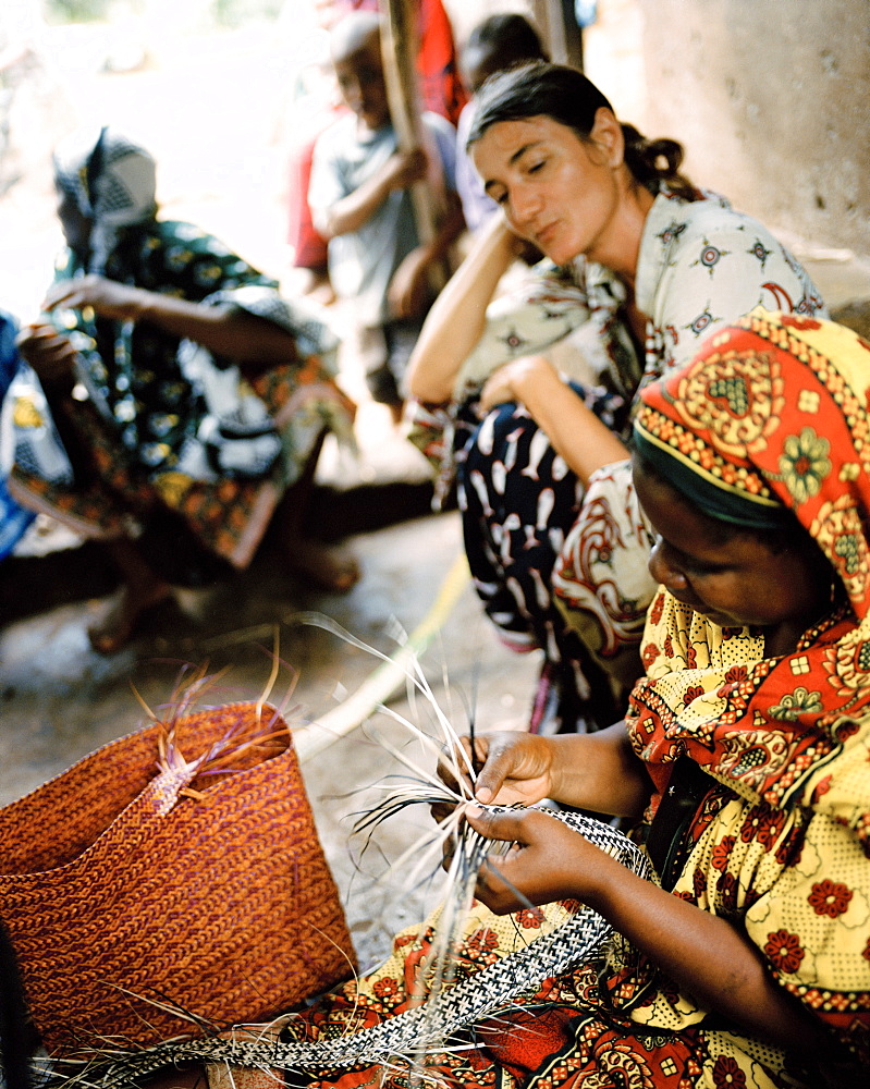 Traditional Ukili Plaiting, date palm leaves get braid into bags, craftwork project Moto, cooperative near Kisomanga (Uroa), east coast, Zanzibar, Tanzania, East Africa