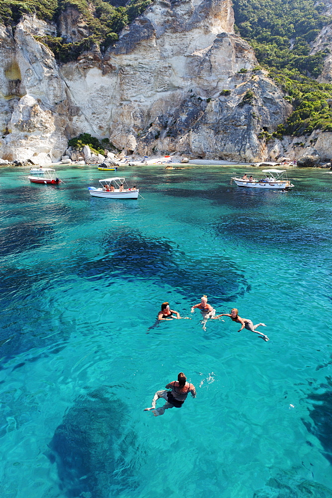 People bathing off Cala Felci beach, Island of Ponza, Pontine Islands, Lazio, Italy, Europe