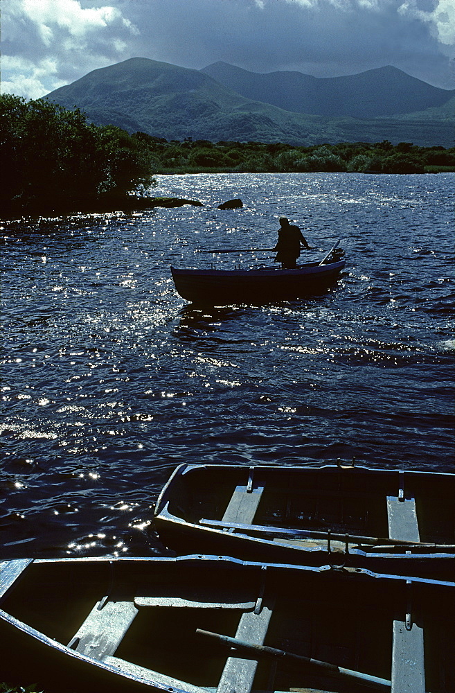 Fisherman on Lough Leane, Killarney National Park, County Kerry, Ireland, Europe