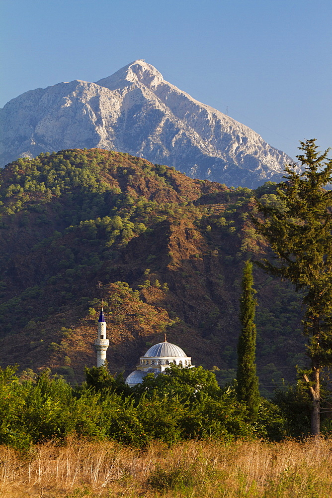 Mosque and Tahtali mountain near ancient Olympos, lycian coast, Lycia, Mediterranean Sea, Turkey, Asia