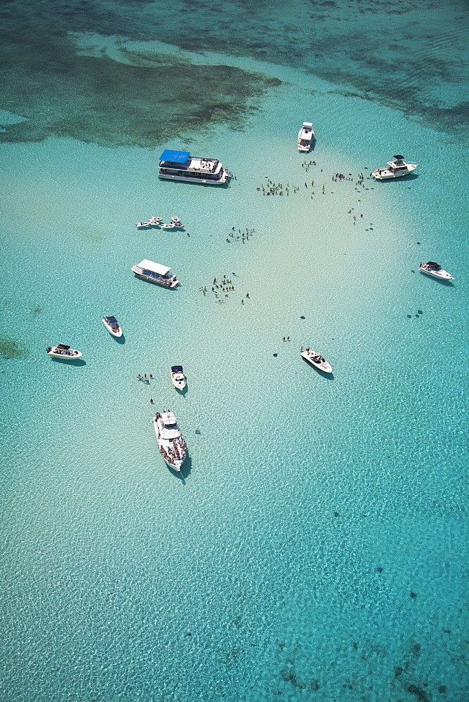 Aerial view of Stingray City sand bank with excursion boats and people swimming, Grand Cayman, Cayman Islands, Caribbean