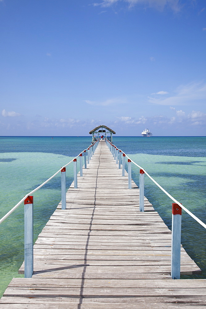 Pier at Punta Frances Parque Nacional with cruise ship MS Deutschland (Reederei Peter Deilmann) in the background, Isla de la Juventud, Cuba, Caribbean