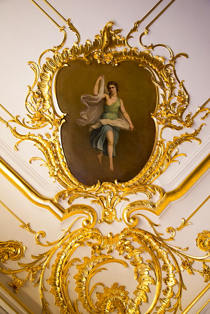 Golden decoration and painting on ceiling inside Catherine Palace, Tsarskoye Selo, Pushkin, near St. Petersburg, Russia, Europe