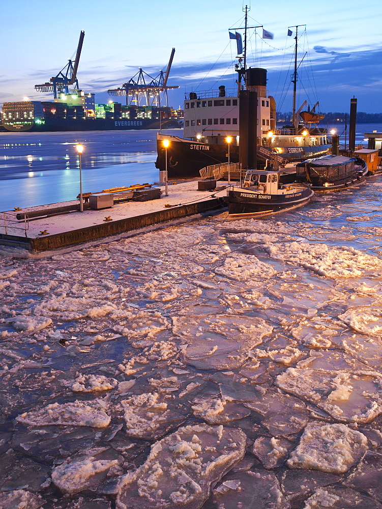 Frozen Elbe river at the harbour museum Oevelgoenne in the evening, Hanseatic City of Hamburg, Germany, Europe