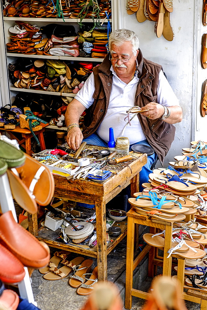 Shoemaker during his work, Capri, Campania, Italy