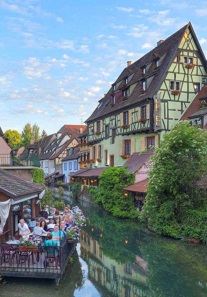 Restaurant and half timbered houses at the Lauch river, Little Venice, Colmar, Alsace, France, Europe